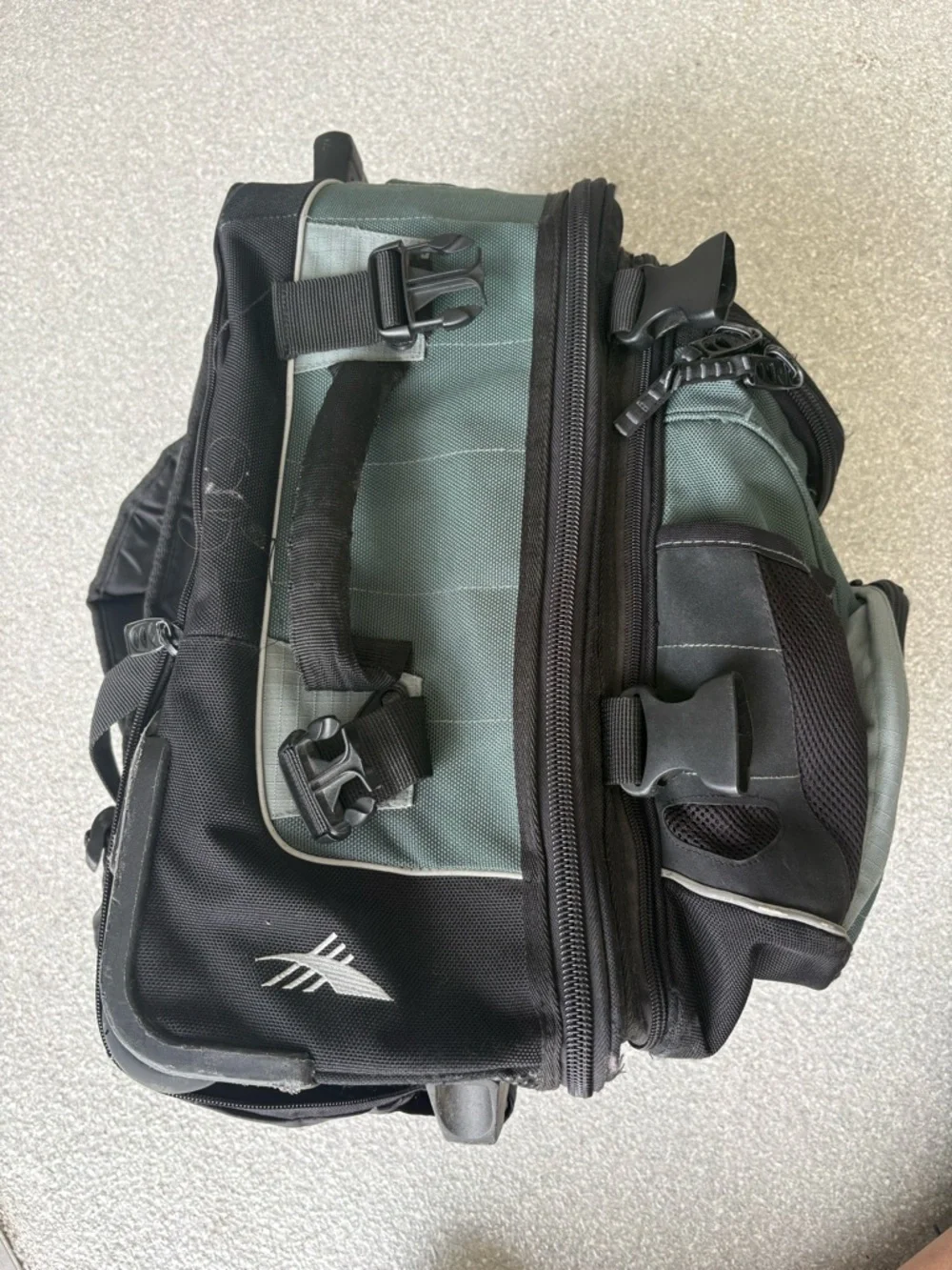 High Sierra Green Rolling Backpack/converts into carry on and regular backpack